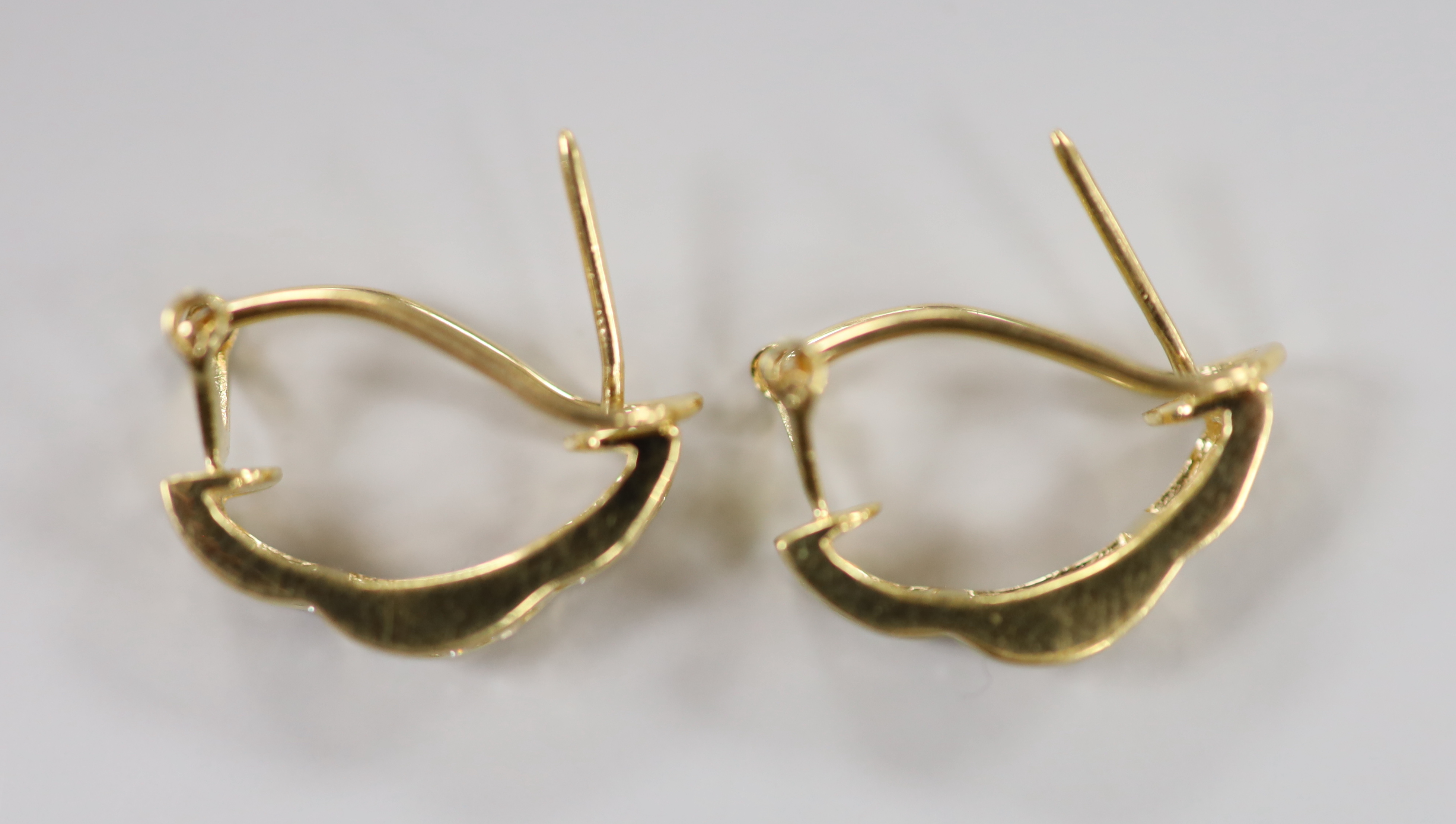 Two modern pairs of 18ct gold and diamond chip cluster earrings, including half hoop, 15mm, gross weight 6.9 grams.